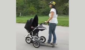 mom attaches skateboard to stroller